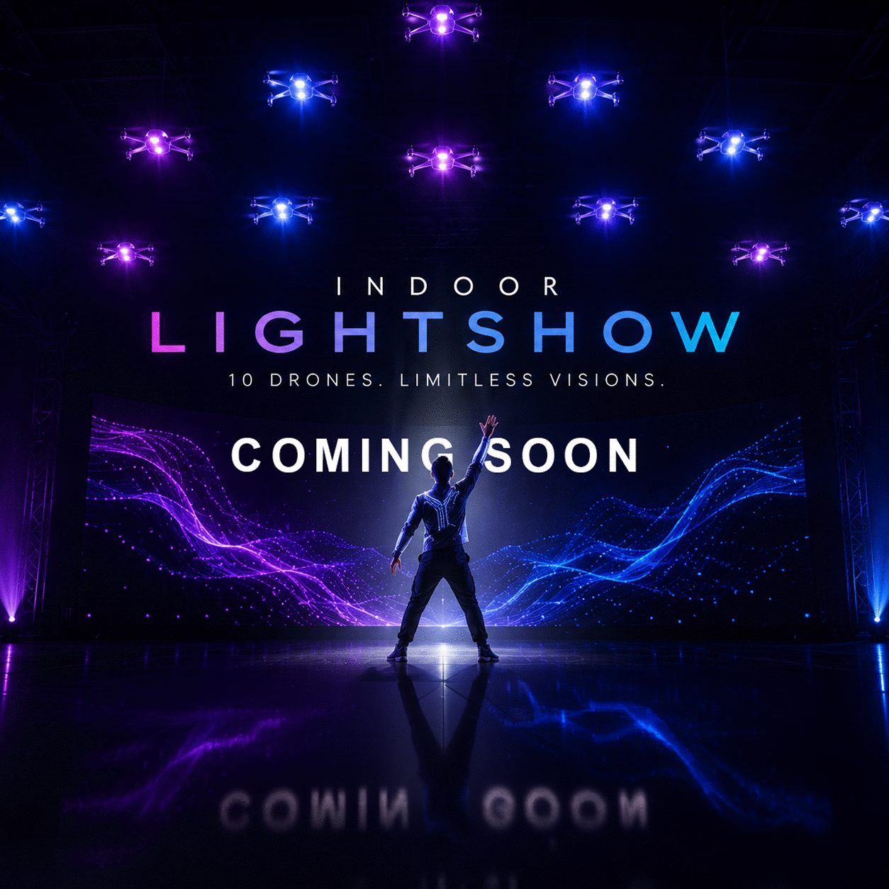 Indoor drone light show above an audience